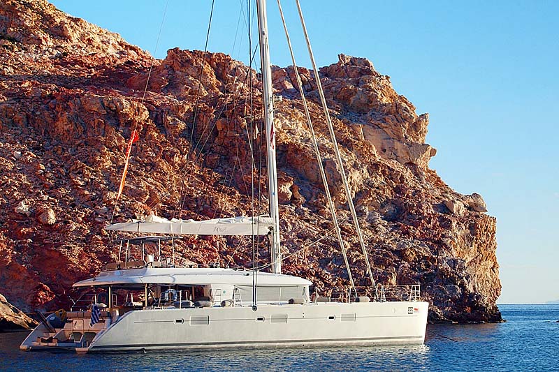 Nigel James Yacht Charter Crewed catamaran Nova in secluded Greek anchorage