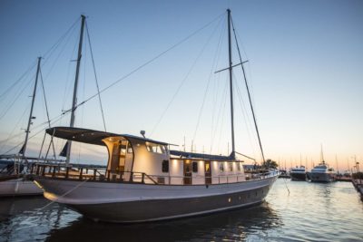 Charter the classic crewed motor sailer Comos in Greece